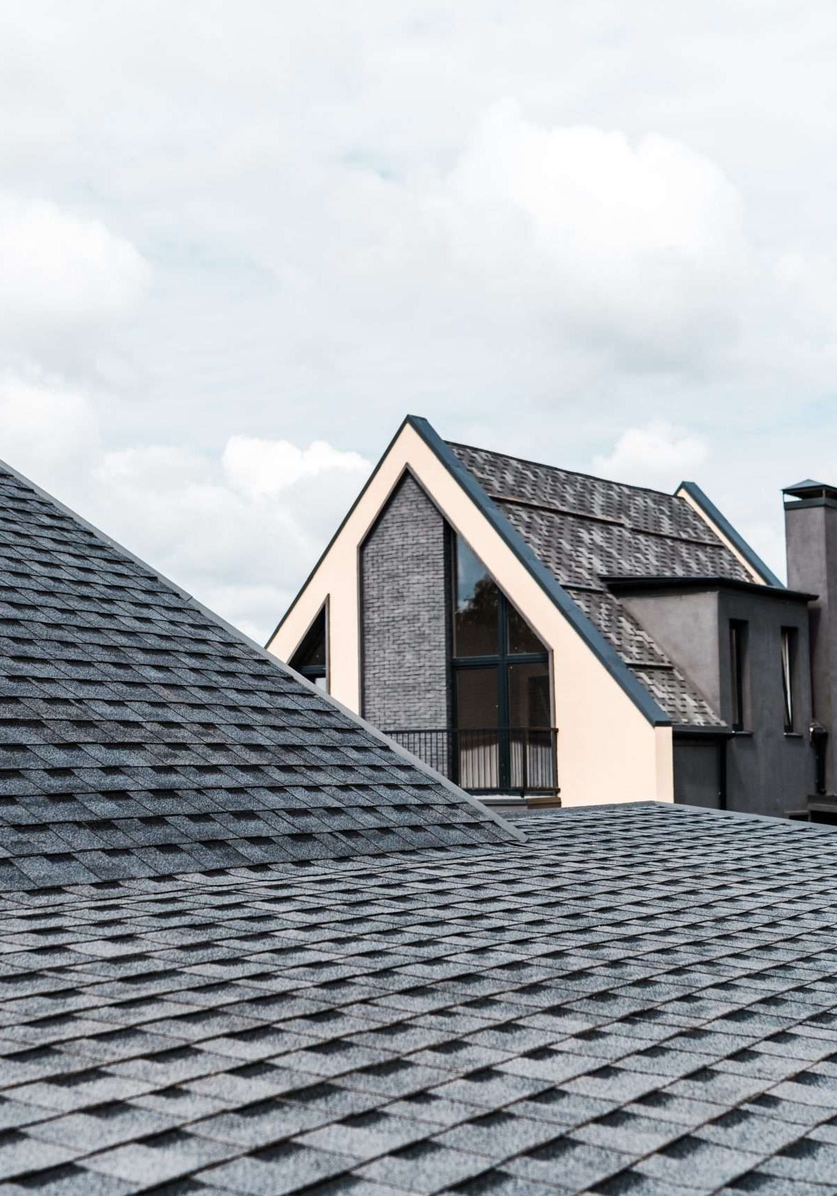 selective focus of building with windows near rooftop