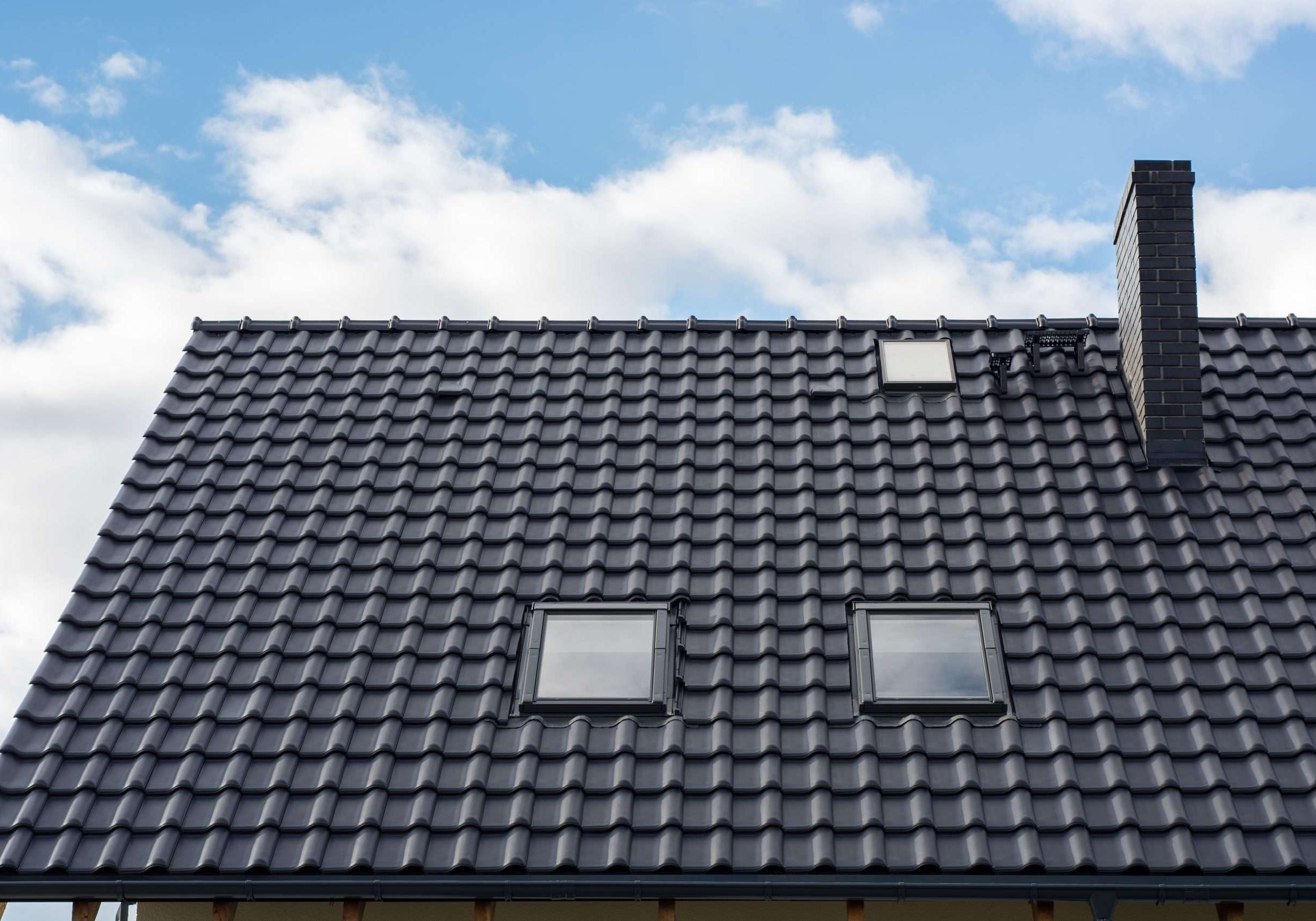 new roof with sunroof windows and shimney